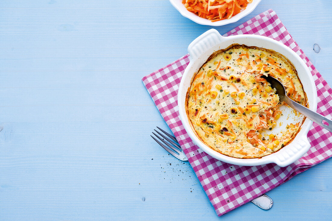 Carrot, curd and vegetables in casserole