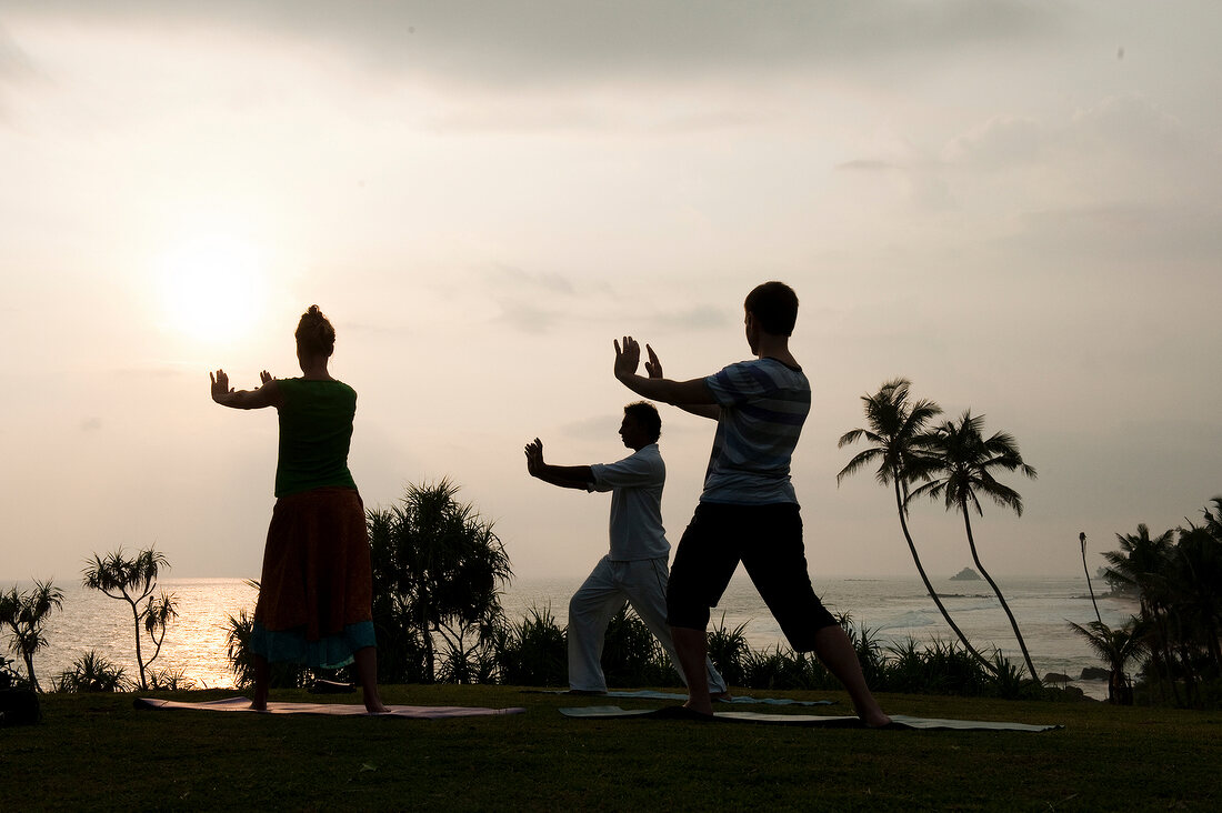 People performing Tai Chi at Barberyn Reef Ayurveda Resort, Weligama, Sri Lanka