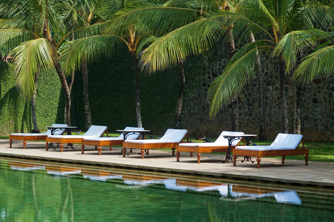 View of loungers and pool at Amangalla hotel, Galle Fort, Sri Lanka