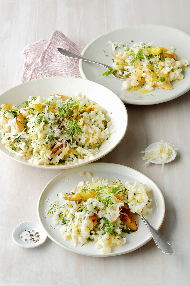 Three plates of spring risotto