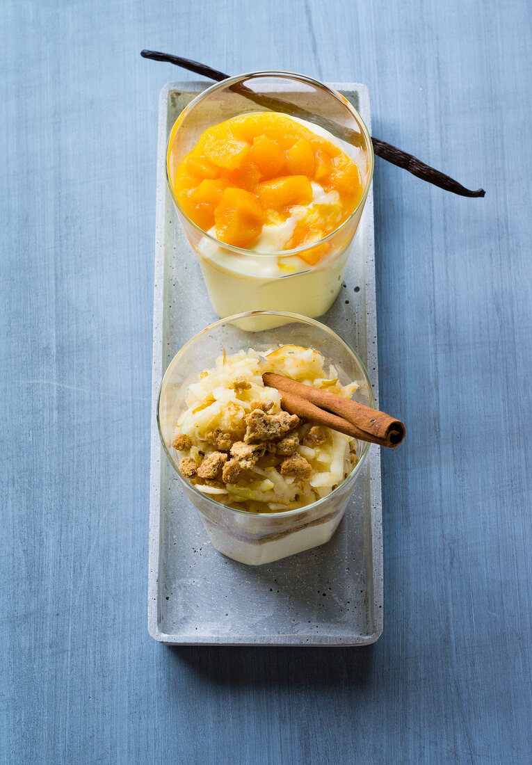 Apricot with vanilla, cottage cheese and cream in bowls 