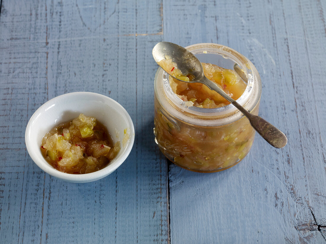 Apple and cucumber relish jam in jar and bowl