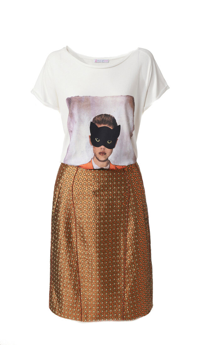 Printed T-shirt and metallic A-line skirt on white background