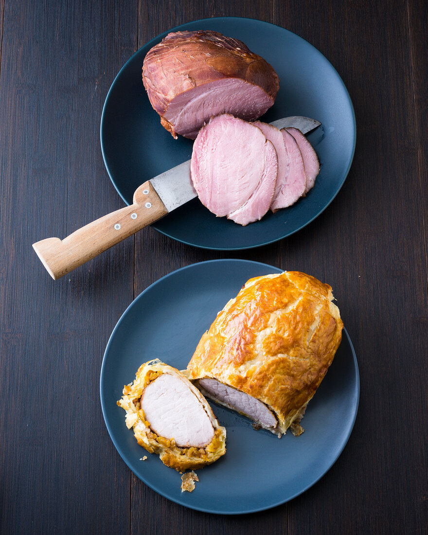 Baked burgundian ham on plate, overhead view