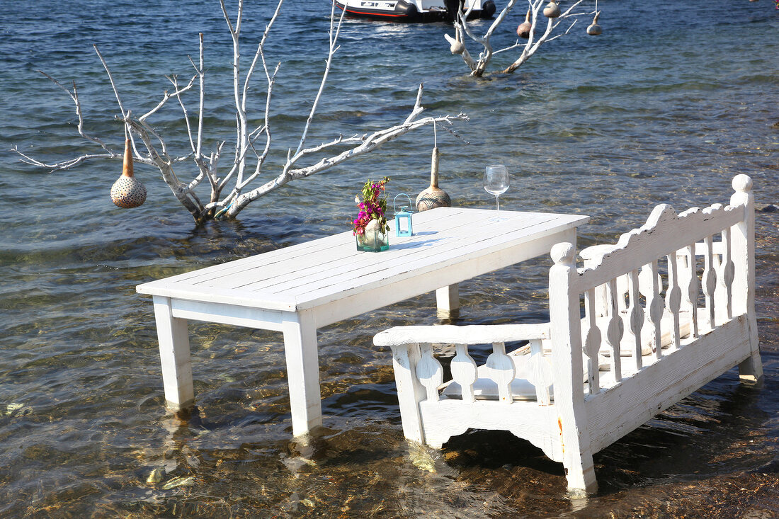 Table of Mimoza Restaurant in water at Gumusluk, Bodrum Peninsula, Aegean Region, Turkey