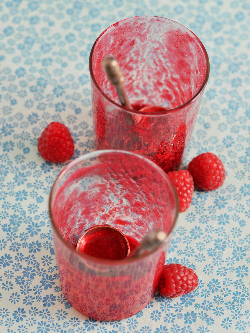 Empty glasses of raspberry dessert