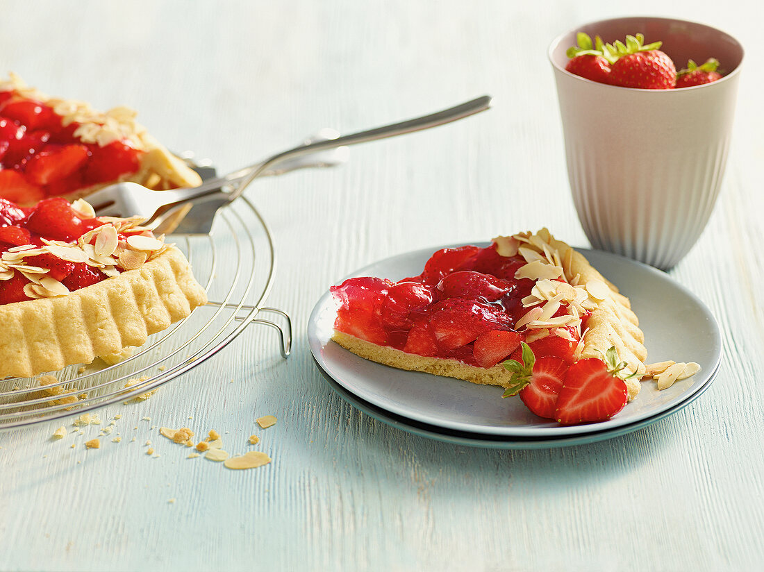 Slice of strawberry cake on plate