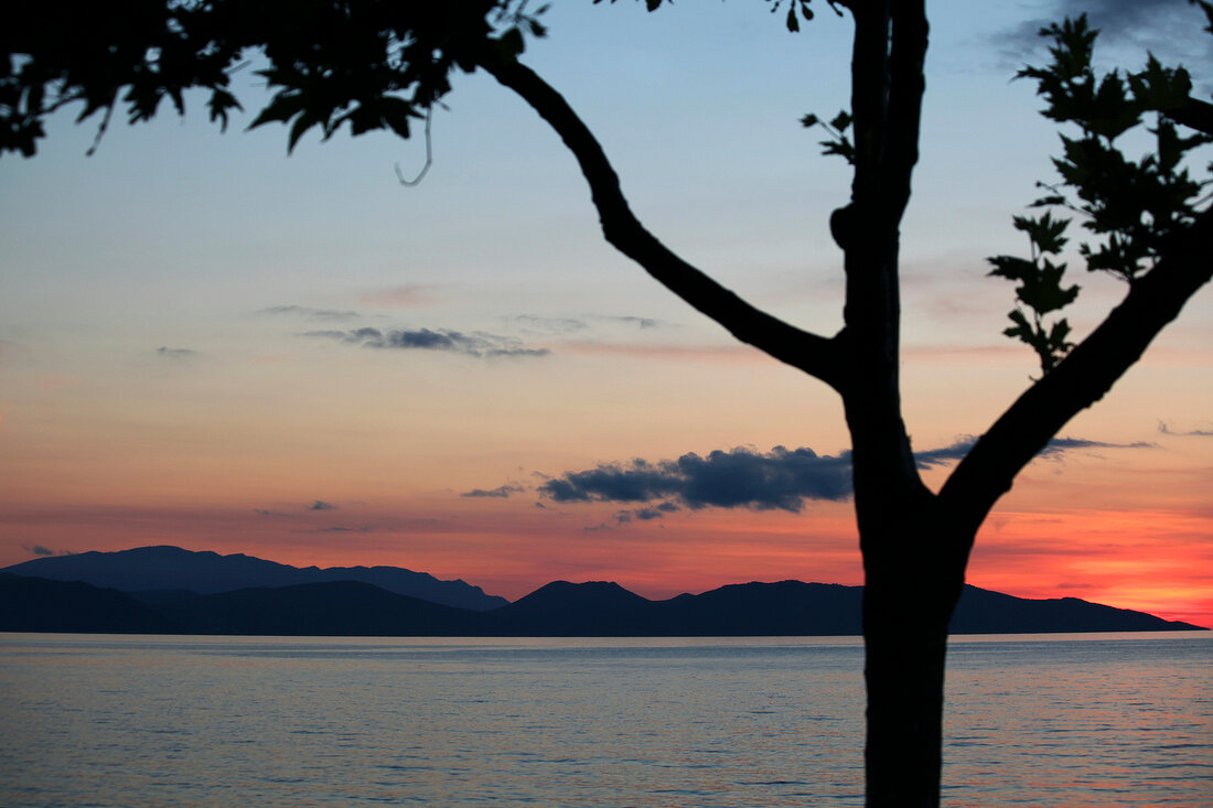 View of sea and mountain at dusk in Dilek Peninsula National Park, Turkey