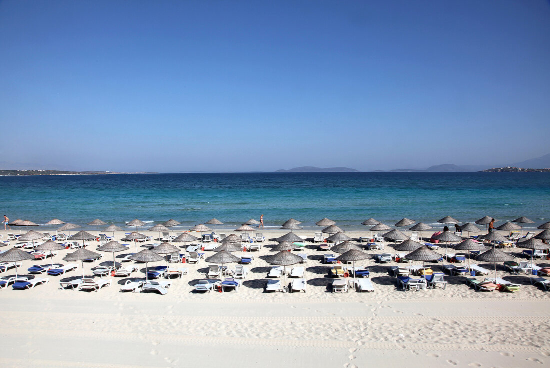 View of beach parasols at Ilica Plajr beach in Cesme, Aegean, Turkey