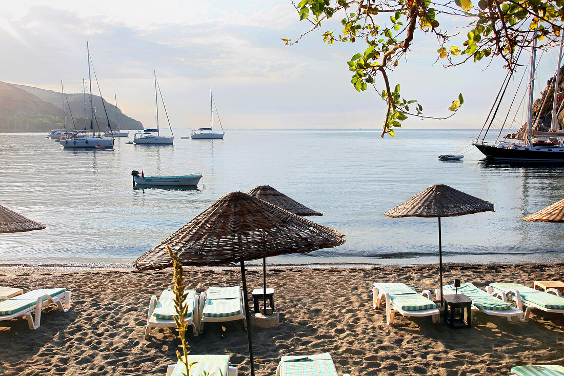 Beach umbrellas on beach in Ovabuku, Mesudiye in Ordu Province, Turkey