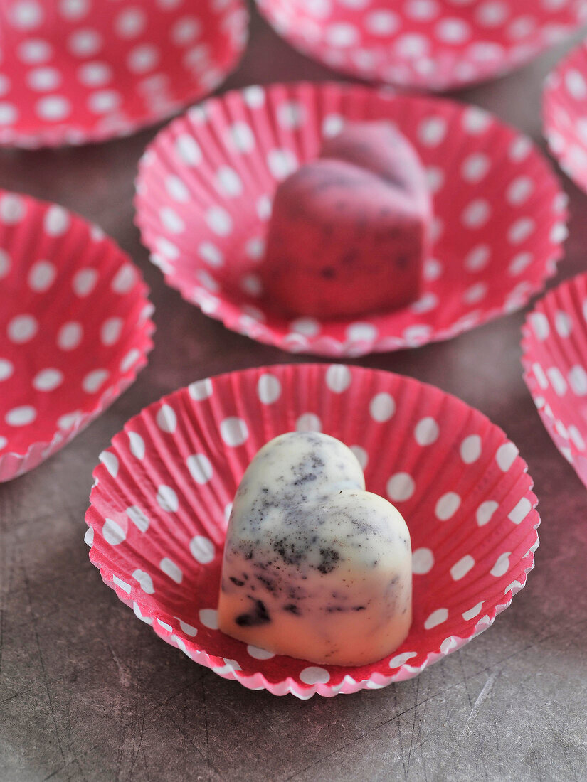 Heart shaped cookies on paper cups