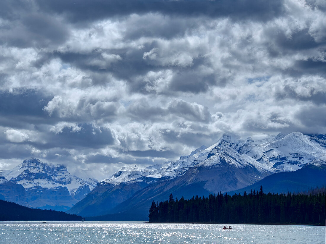 View of Maligne Lake, mountains and clouds at Jasper National Park, Alberta, Canada