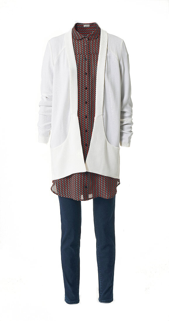 Oversized blazer, silk blouse and jeans on white background