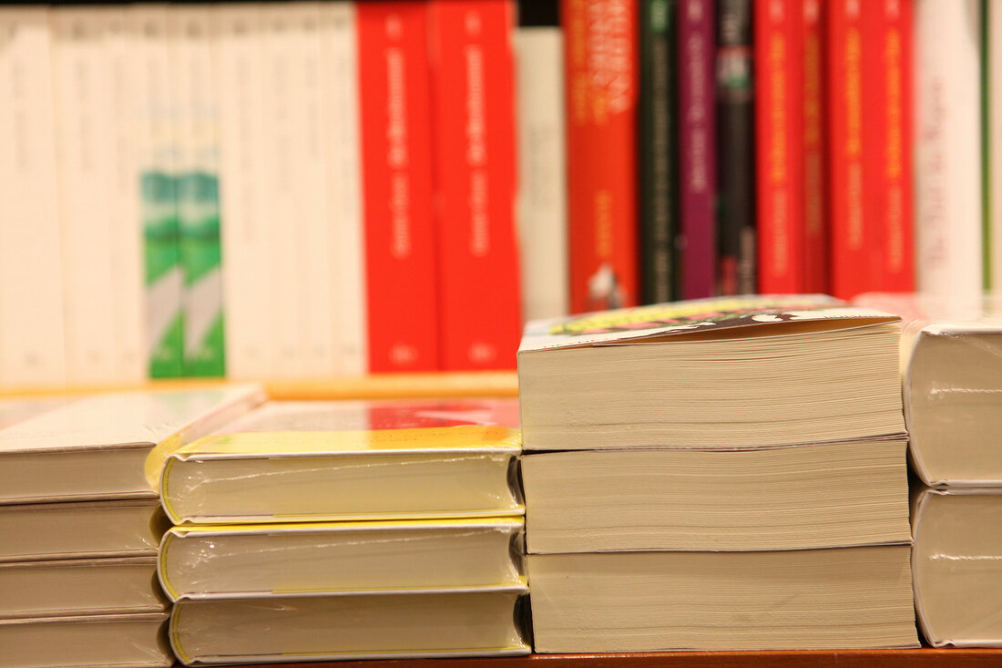 Close-up of stack of books on shelf