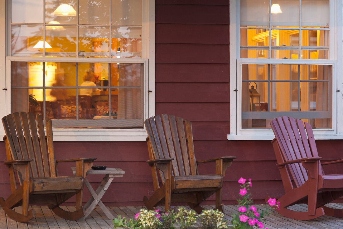 Three wooden chairs in Dalvay by the sea, Prince Edward Island National park, Canada