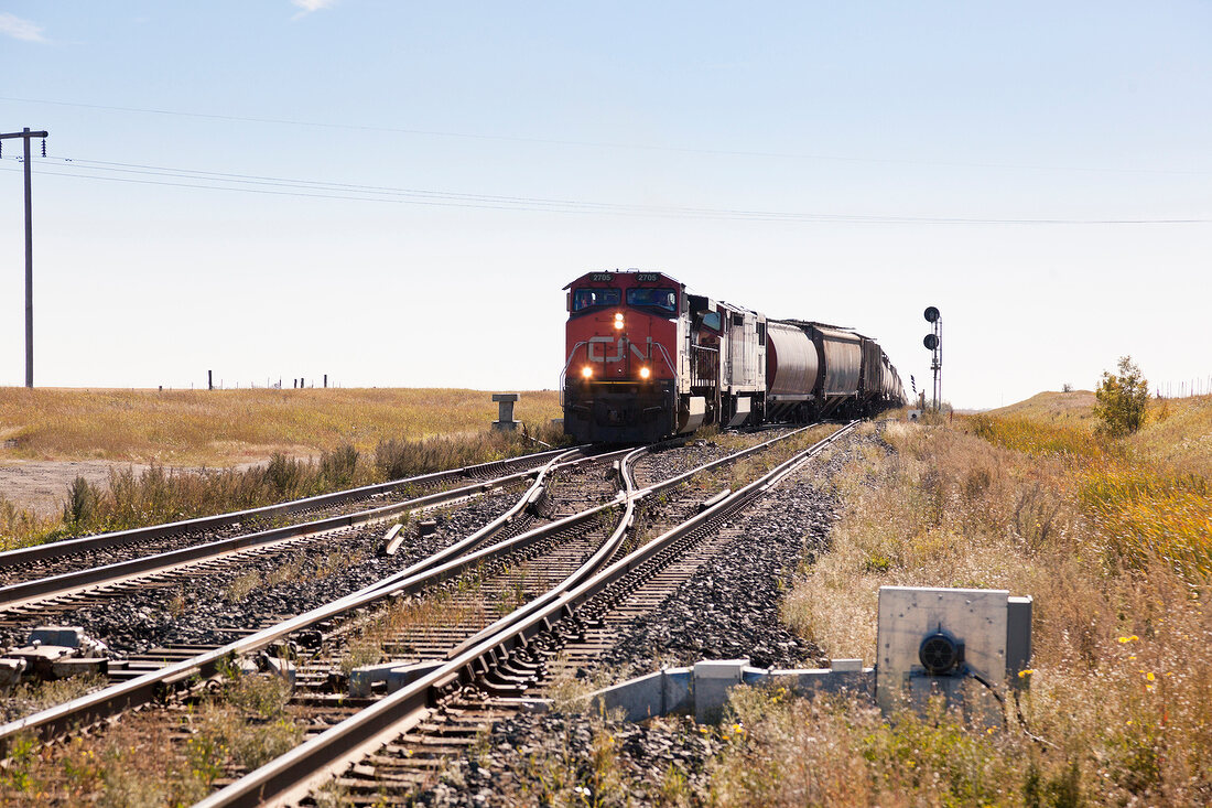 View of train and railway line in Watrous small town, Saskatchewan, Canada
