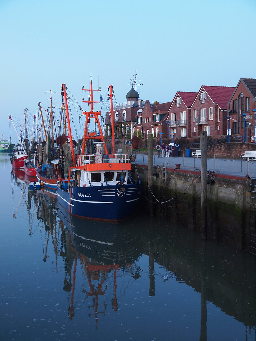 Boats moored at port of Neuharlingersiel, Lower Saxony, Germany