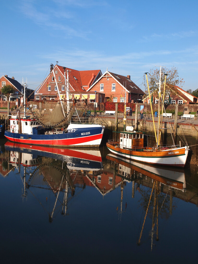 Boats moored at port of Neuharlingersiel, Lower Saxony, Germany