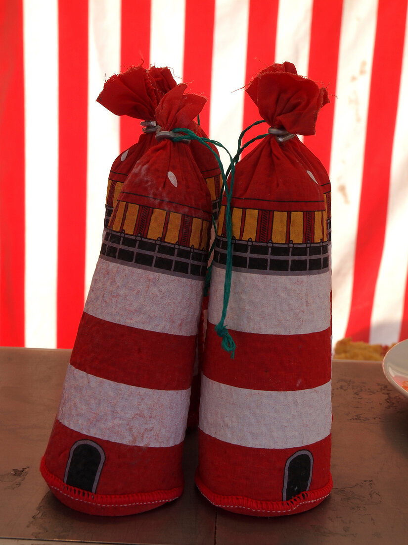 Close-up of souvenirs in form of lighthouse, Neuharlingersiel, Spiekeroog, Germany