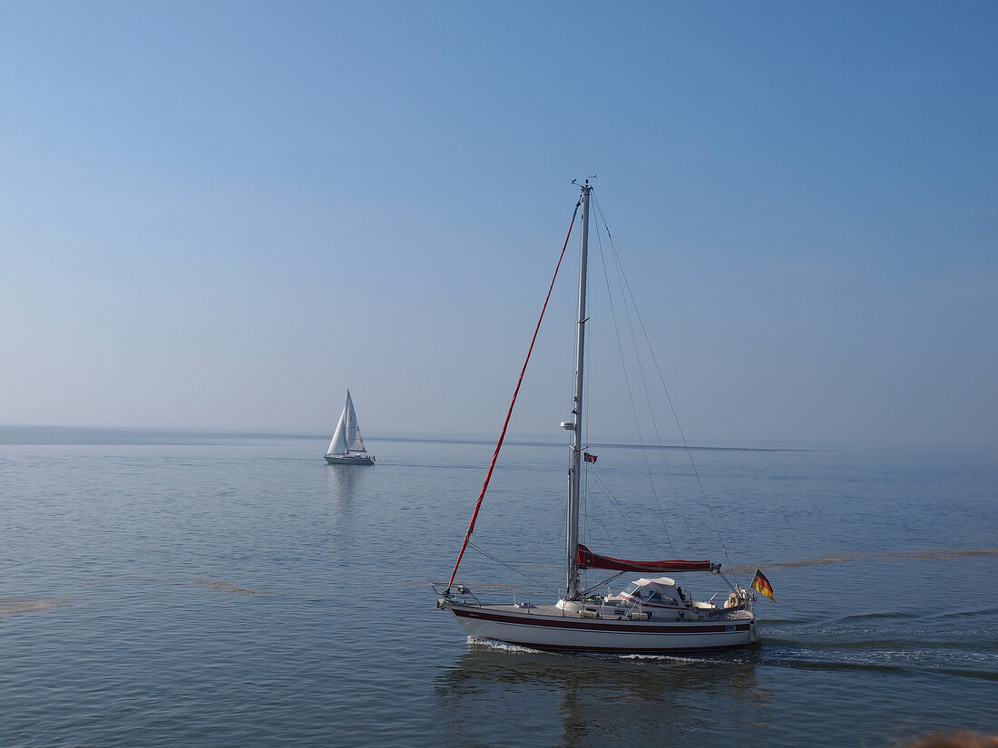 Sailboat in sea at Spiekeroog, Lower Saxony, Germany
