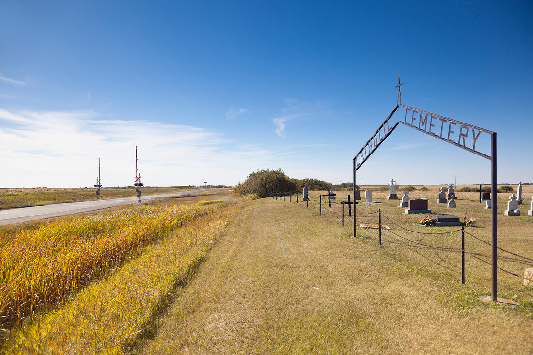 View of Catholic cemetery and landscape on Highway 15, Saskatchewan, Canada
