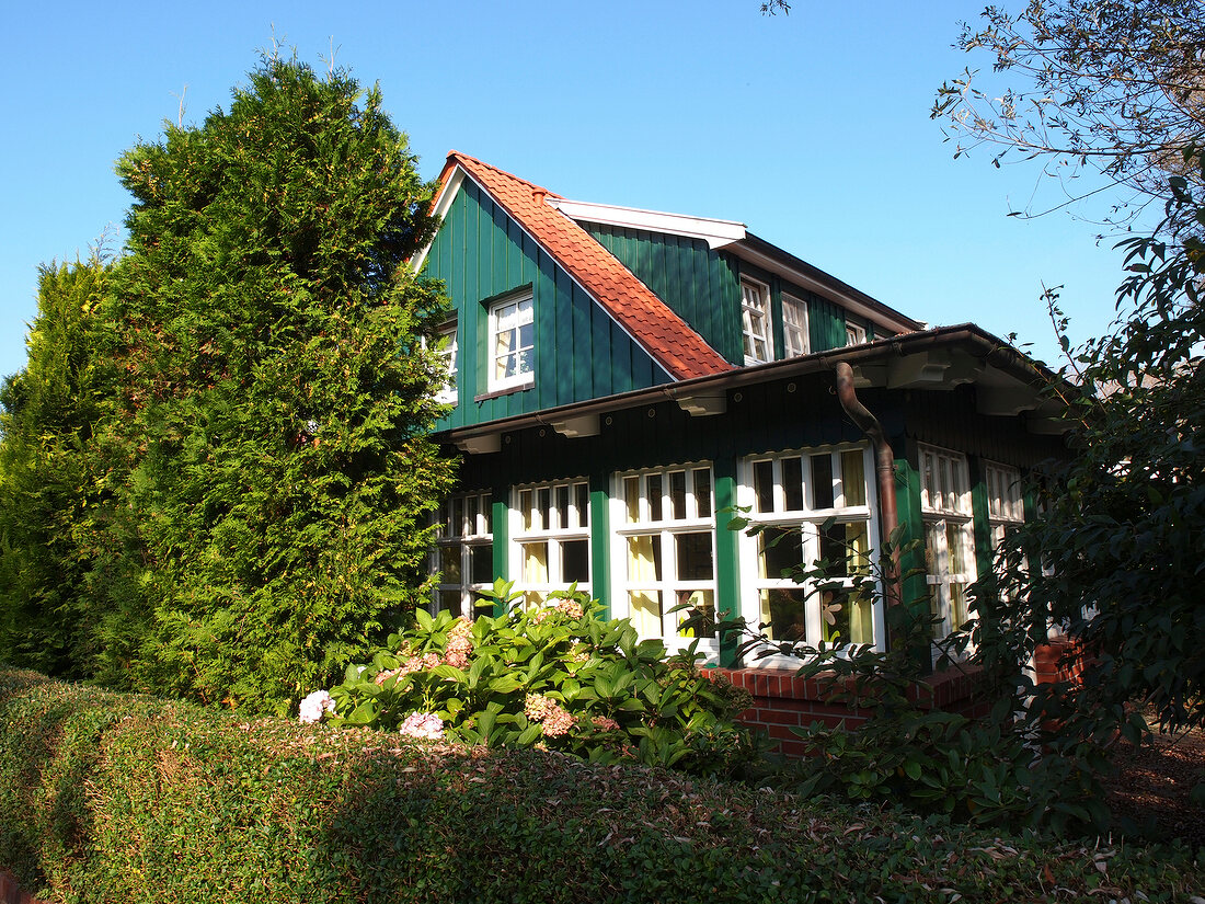 View of residential house and trees on Spiekeroog Island, Germany