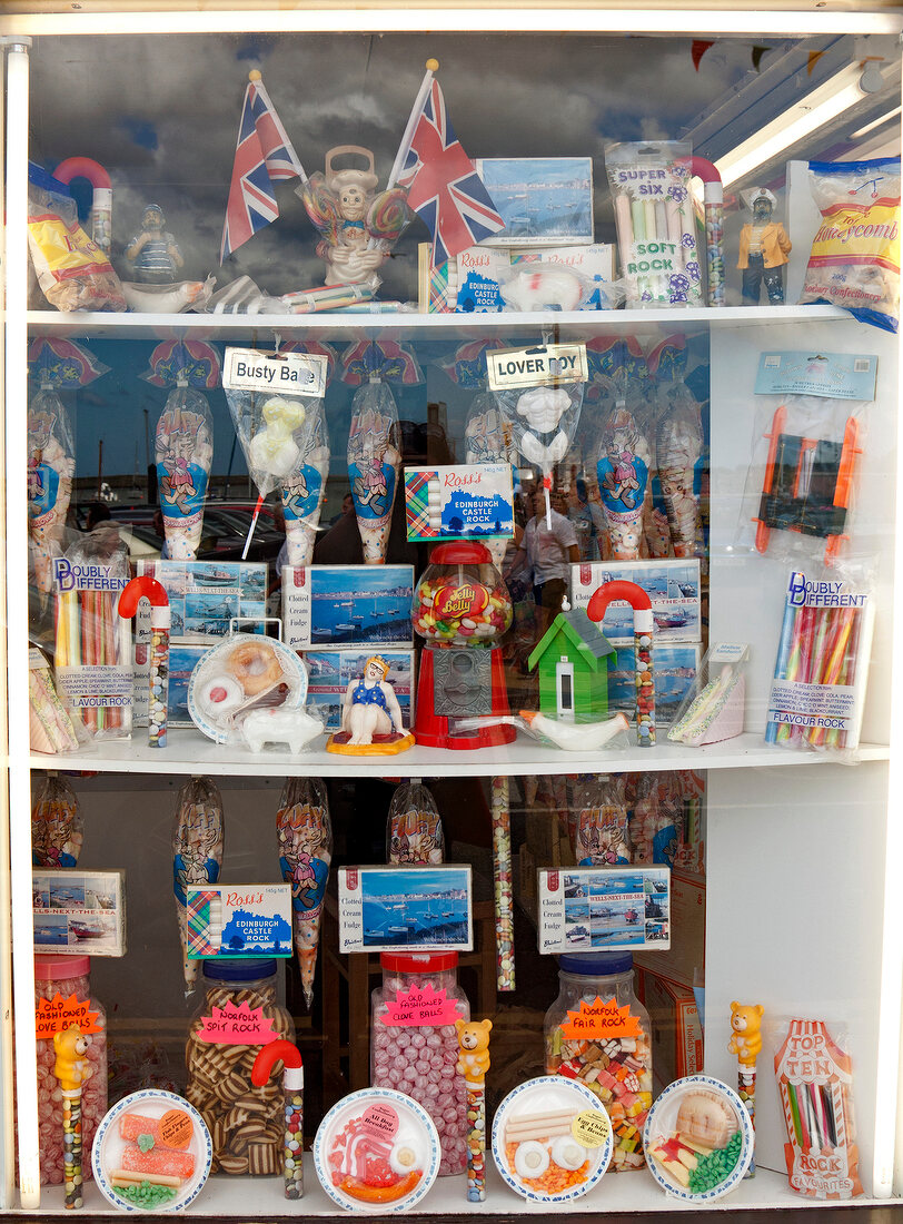 Close-up of various of confectionaries in window display of store, England