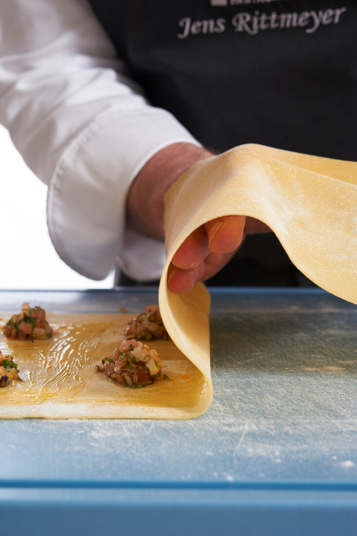 Close-up of chef preparing ravioli