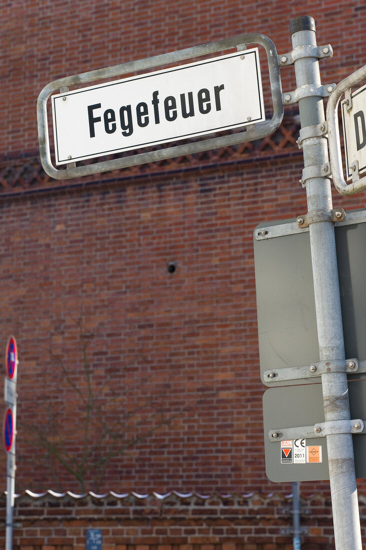 Close-up of signboard of Fegefeuer on street, Lubeck, Schleswig Holstein, Germany