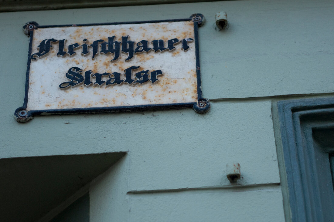 Close-up of street sign of Fleischhauerstra�e in Schleswig Holstein, Germany