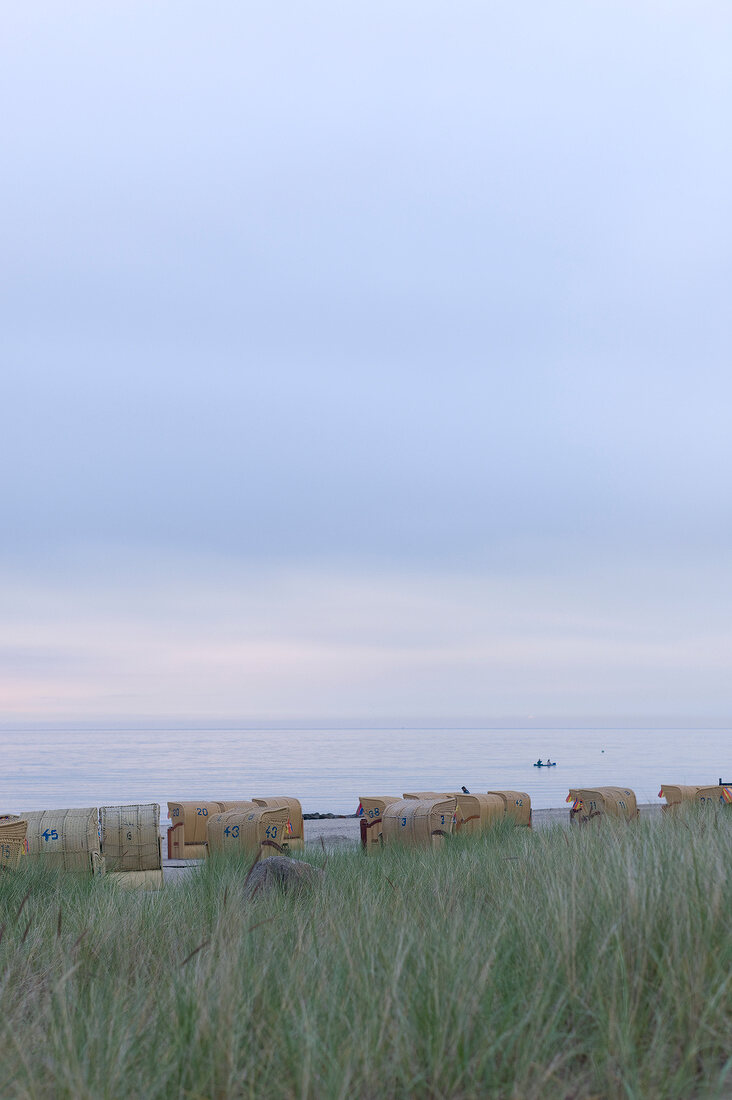 Hooded beach chairs at Gromitz beach in Schleswig Holstein, Germany