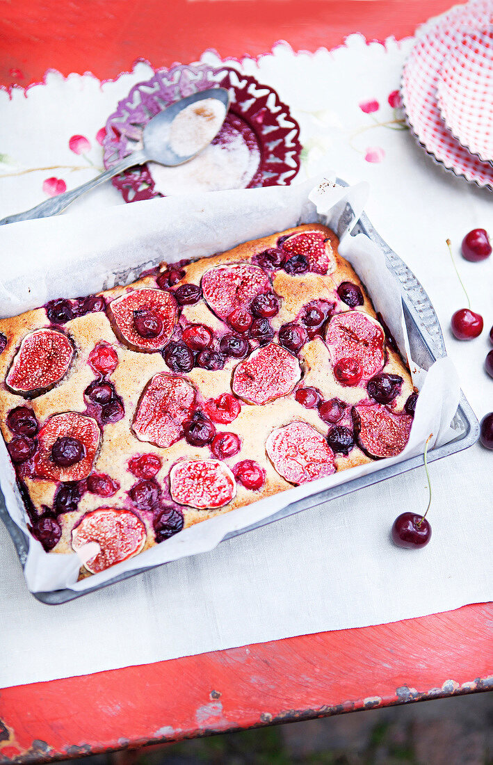 Cherry and fig cake in serving tray