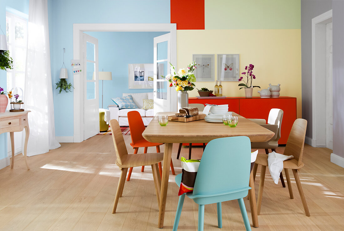 View of dining room overlooking living room in blue