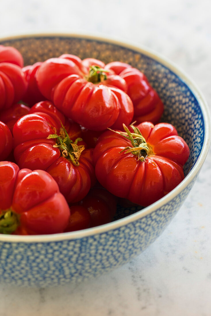 Beefsteak tomatoes in bowl