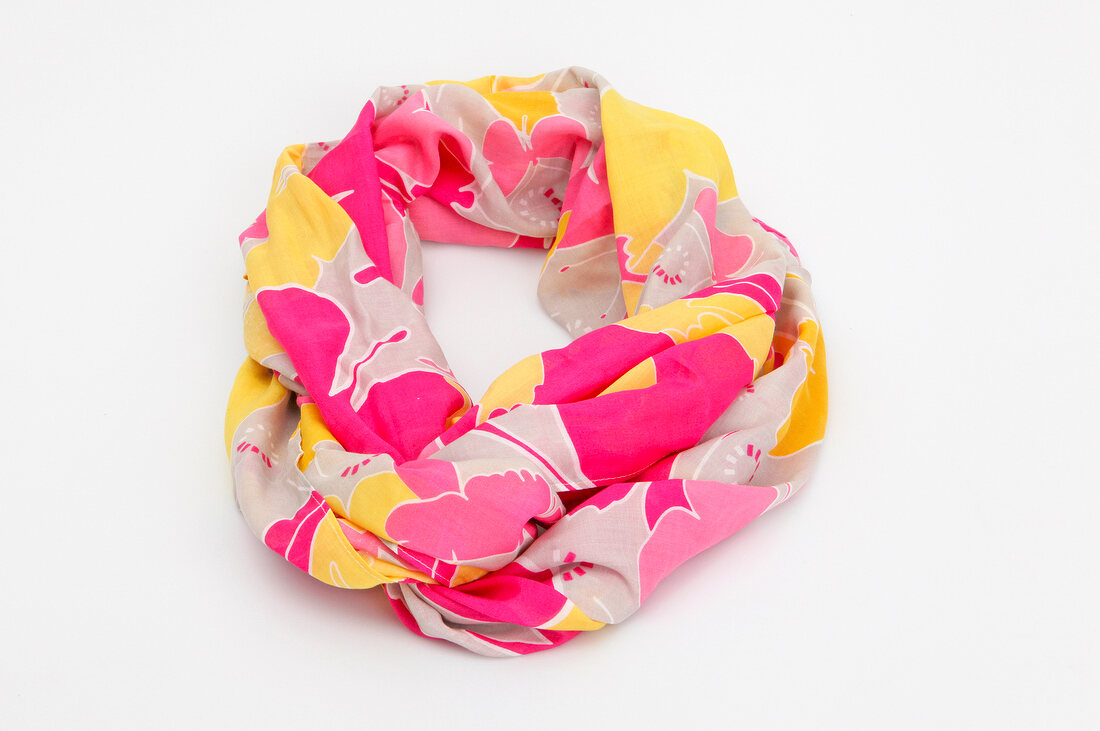 Close-up of colourful scarf on white background