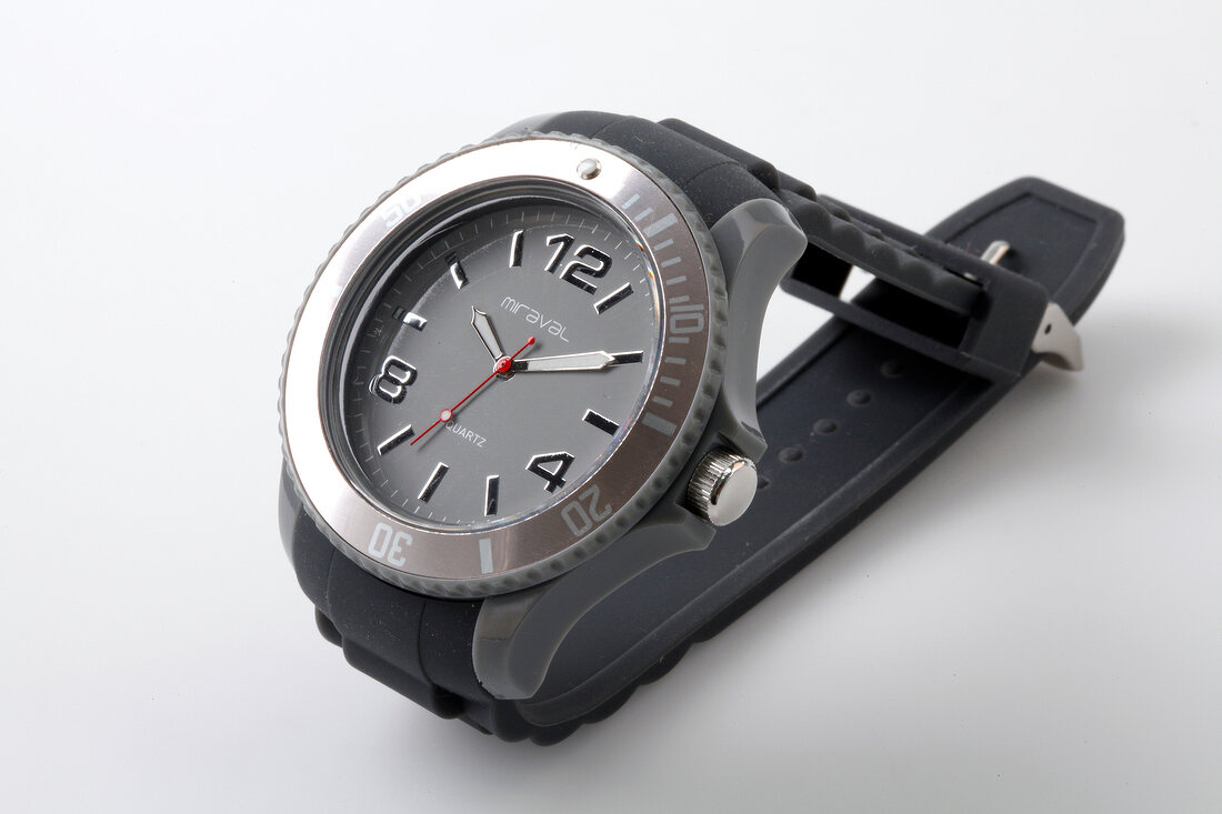 Close-up of watch on white background