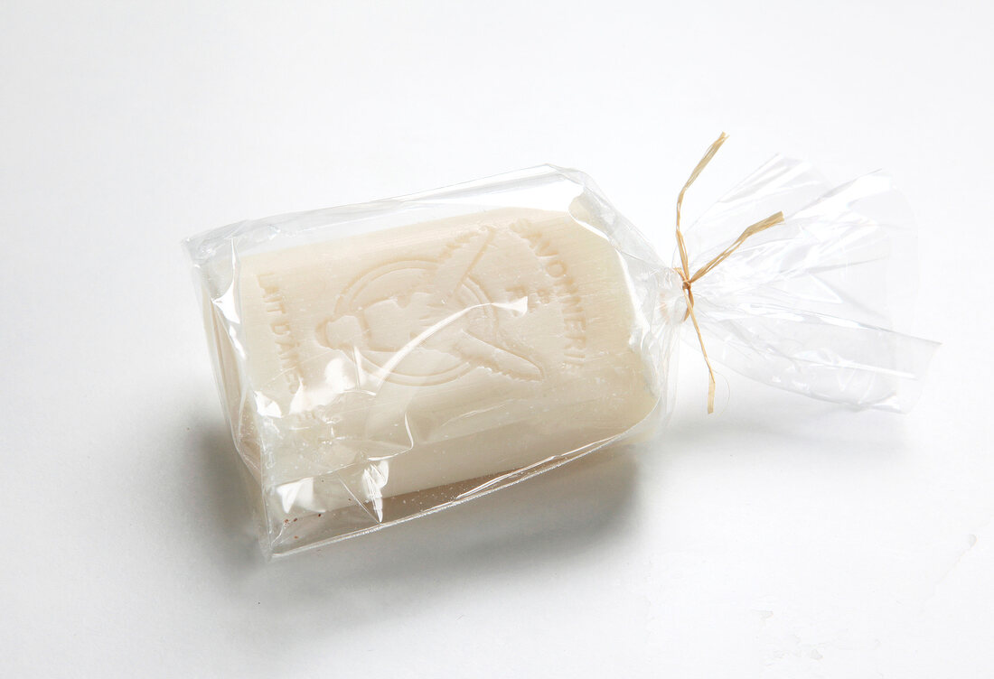  Close up of donkey printed milk soap wrapped in plastic bag on white background 