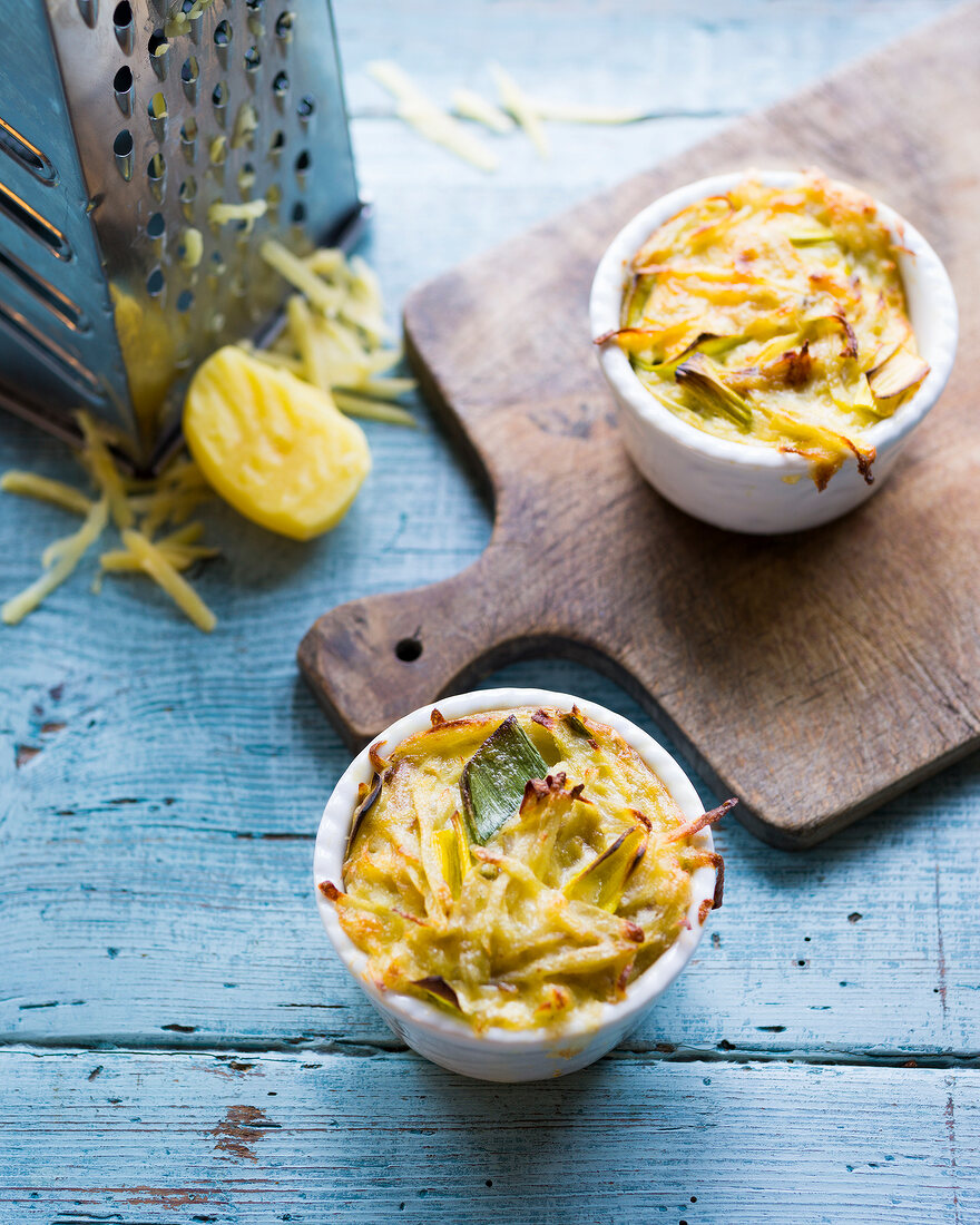 Baked potatoes and anchovy pies in small bowl