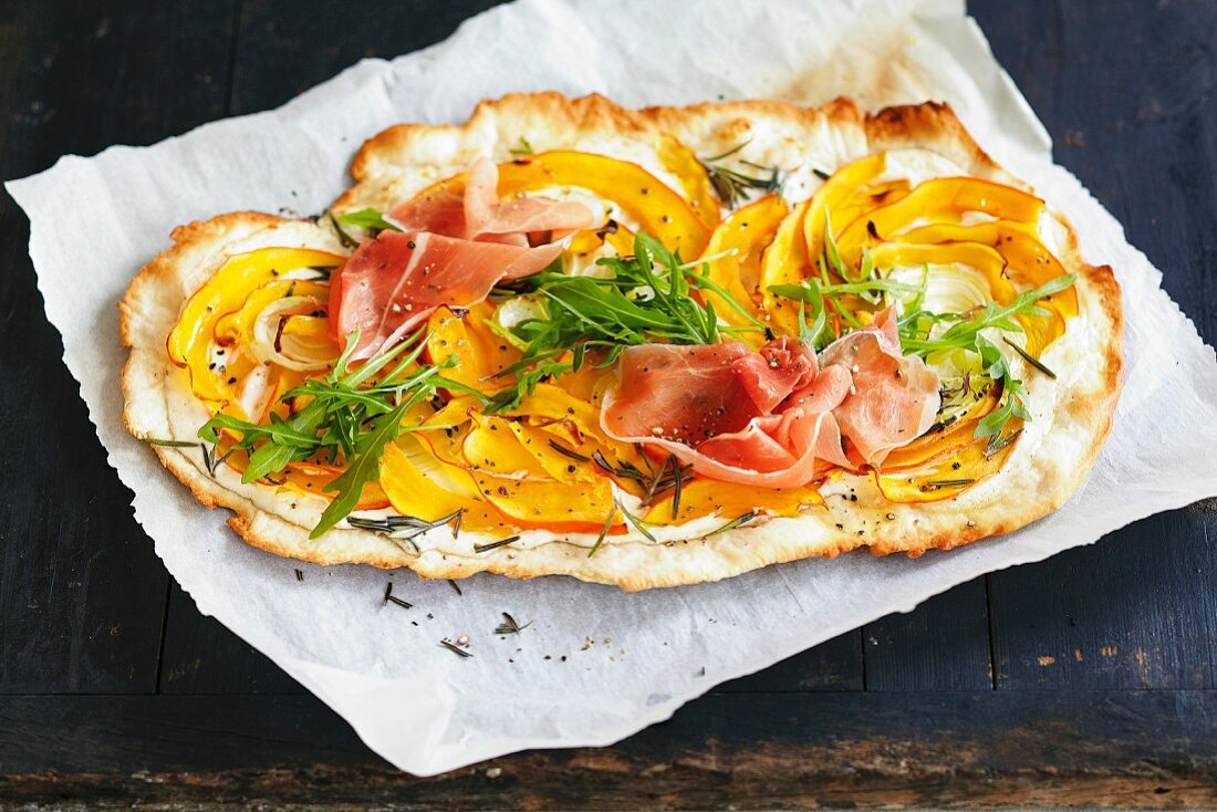 Tarte flambée with pumpkin and ham