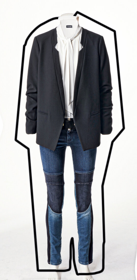 Blue jeans, blazer and white blouse on mannequin against white background