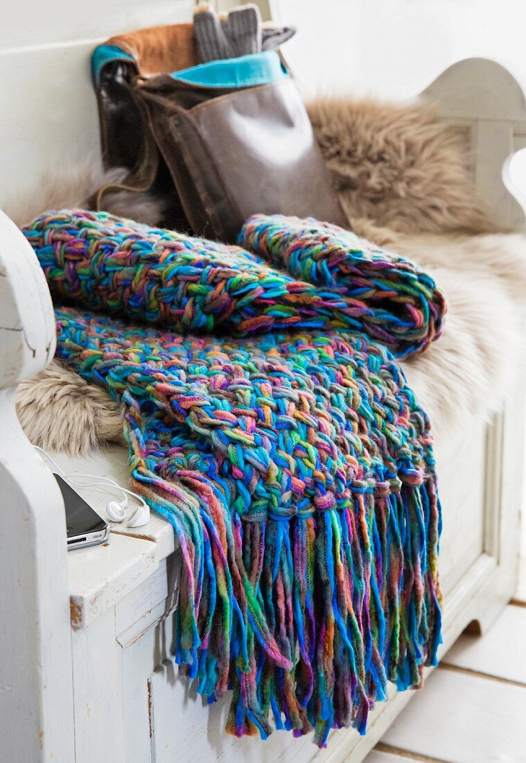 A coloourful scarf with a woven pattern