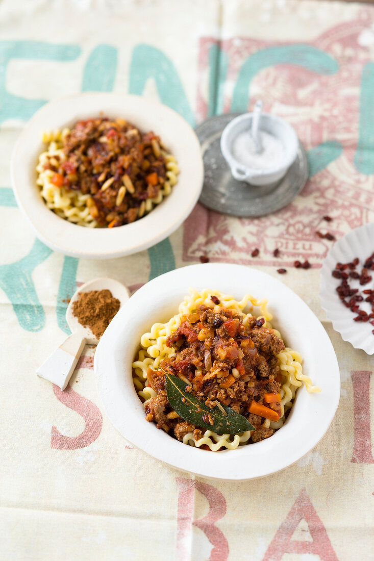 Bolognese oriental food fusilli bucati in bowls