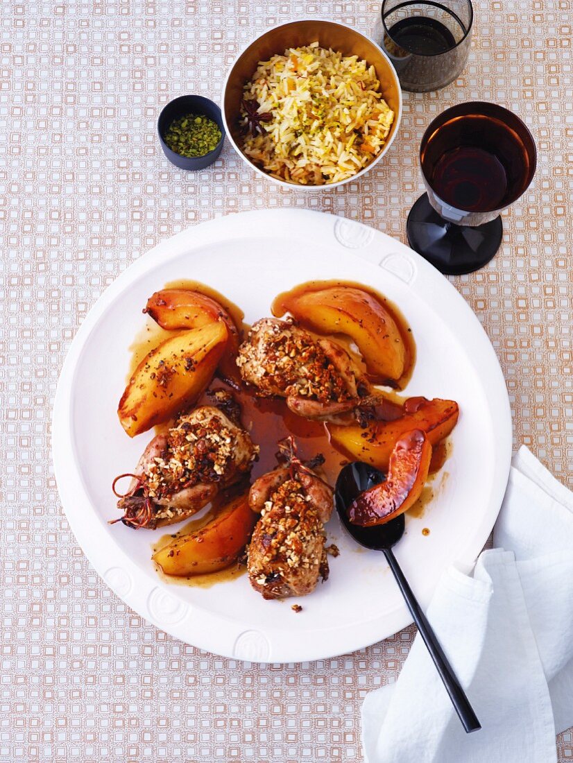 Quails with almonds, braised quinces and pilau rice
