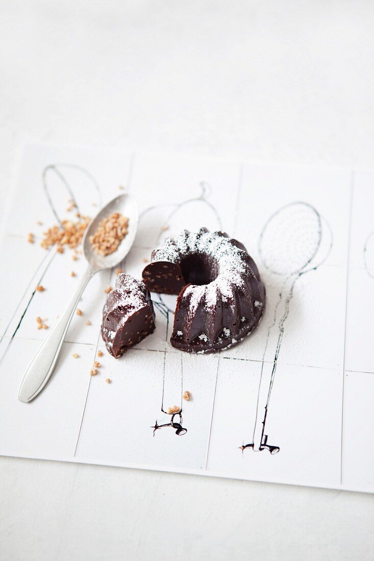 A mini ice cup brittle Bundt cake with chocolate, sliced