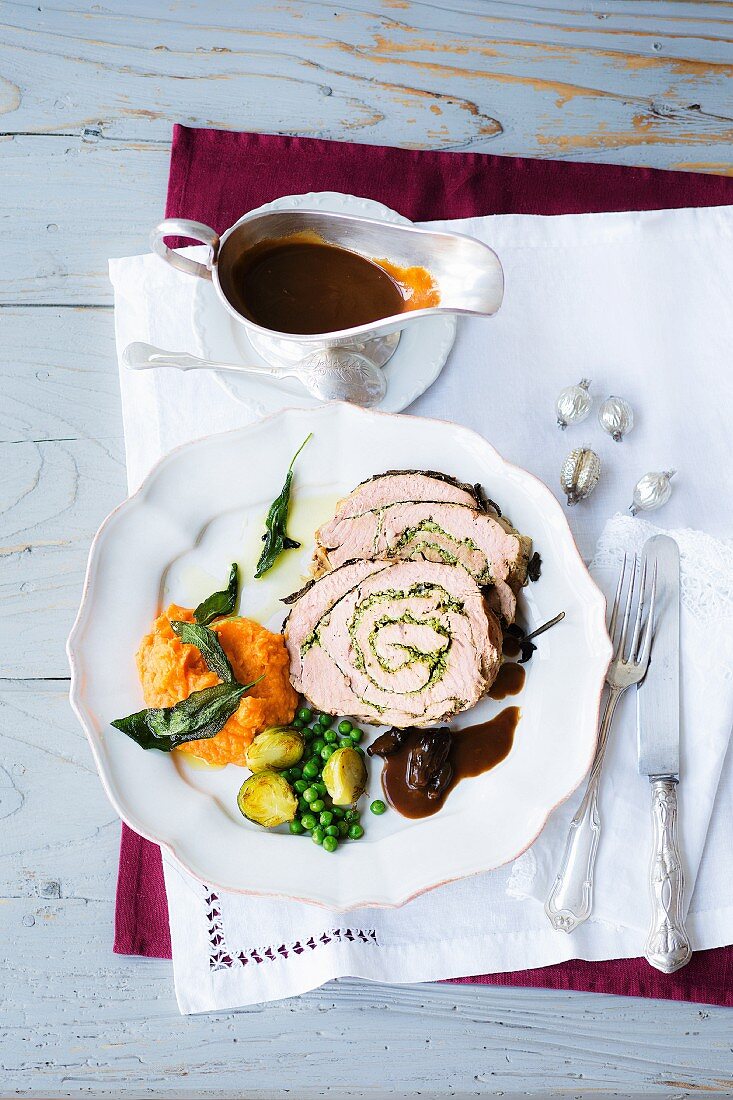 Turkey roulade with mashed sweet potatoes and gravy