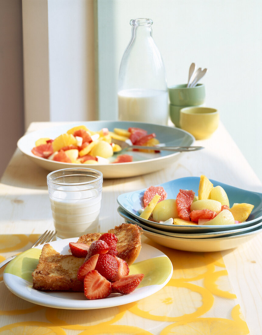 French toast with strawberry and glass of milk