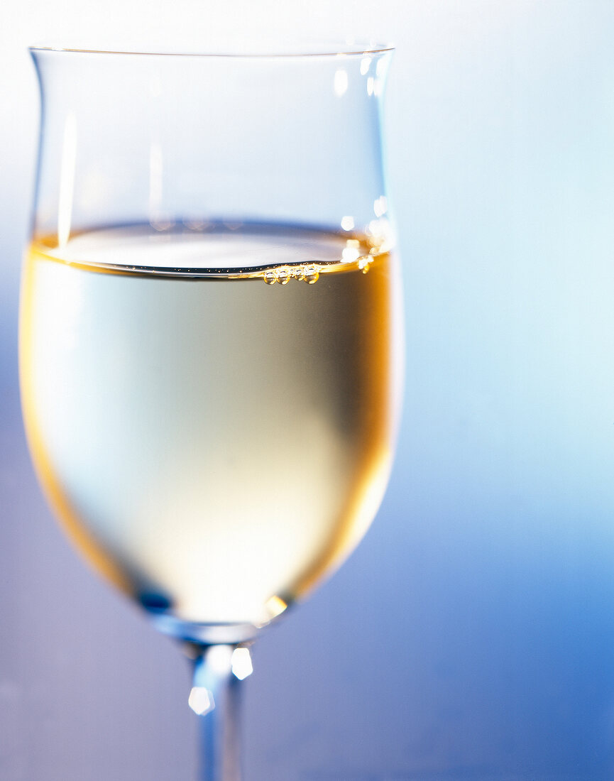 Close-up of white wine in glass