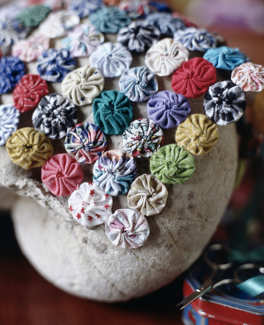 Close-up of hand made colourful fabric circles