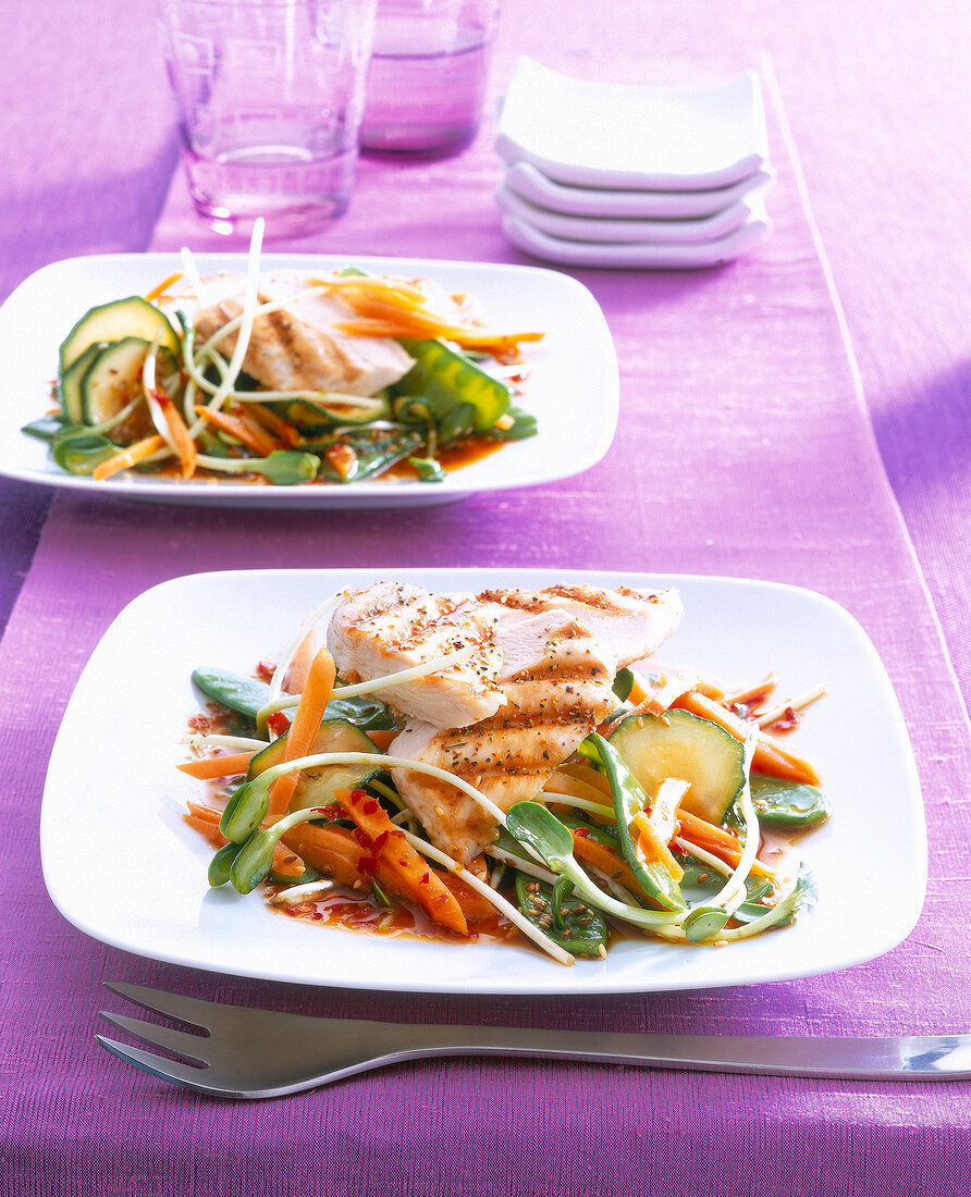 Grilled chicken stuffed with Asian vegetables on plate