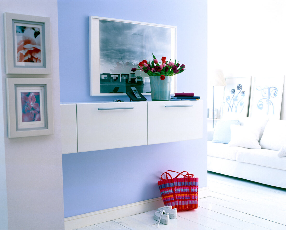 White cabinets on lilac wall